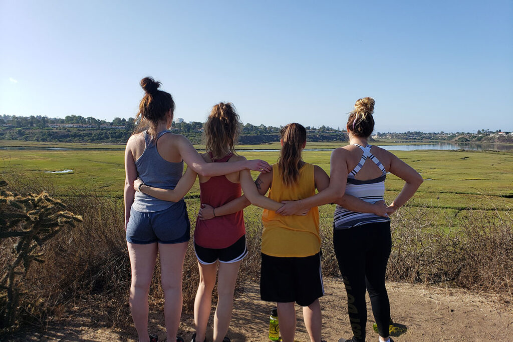 group of women standing on an overlook