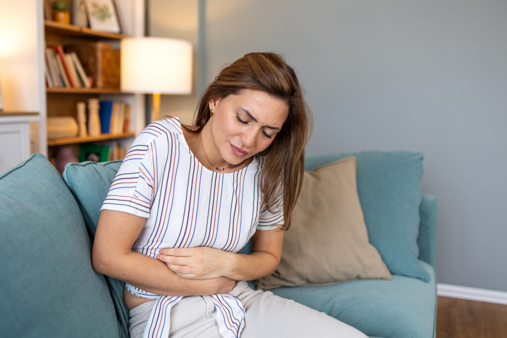 woman-suffering-from-stomach-ache- from-acamporsate-use