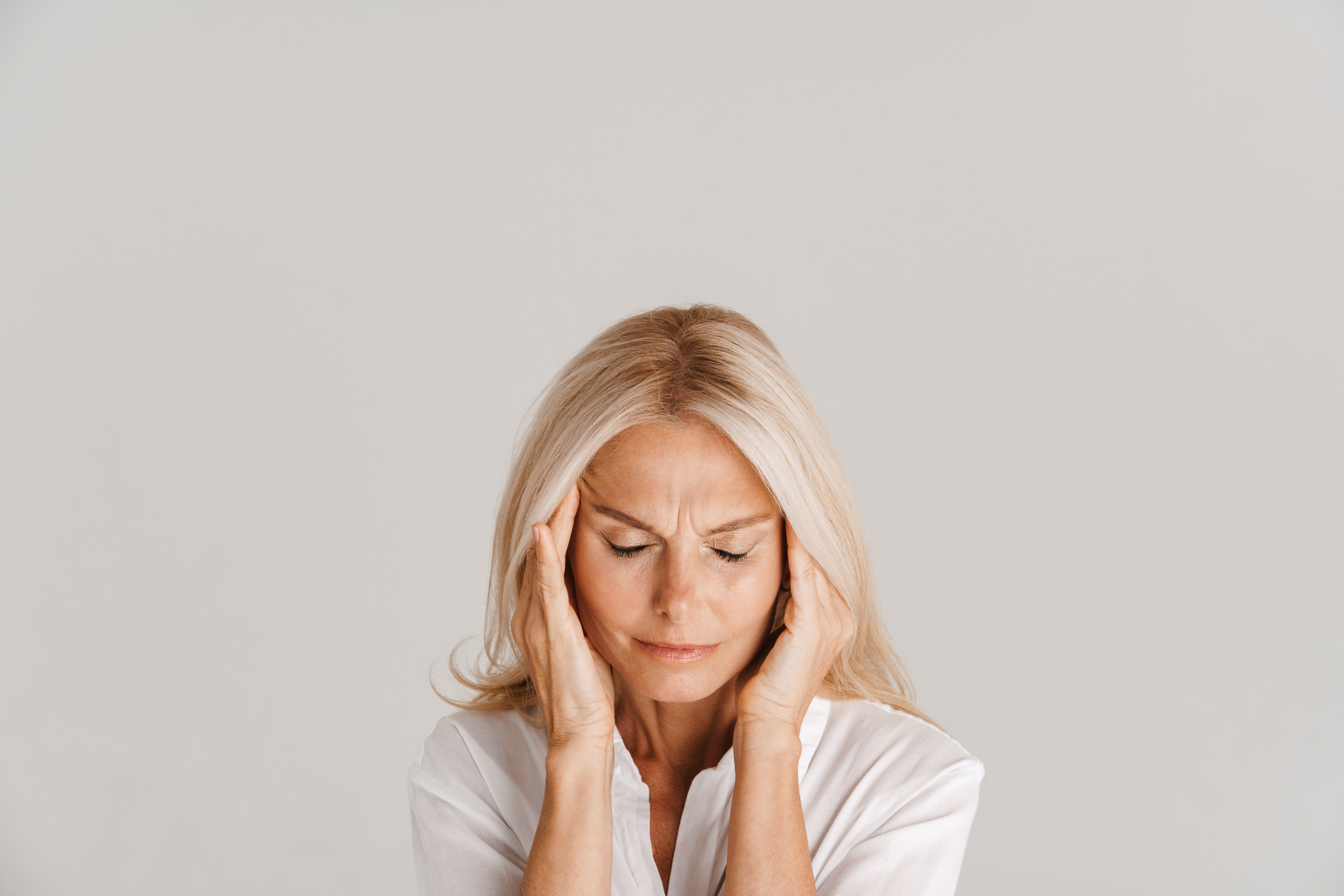 a-woman-suffers-from- headache-an-antabuse- side-effect