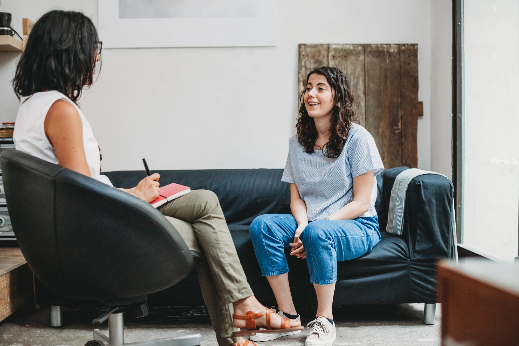 Woman receiving support during addiction treatment