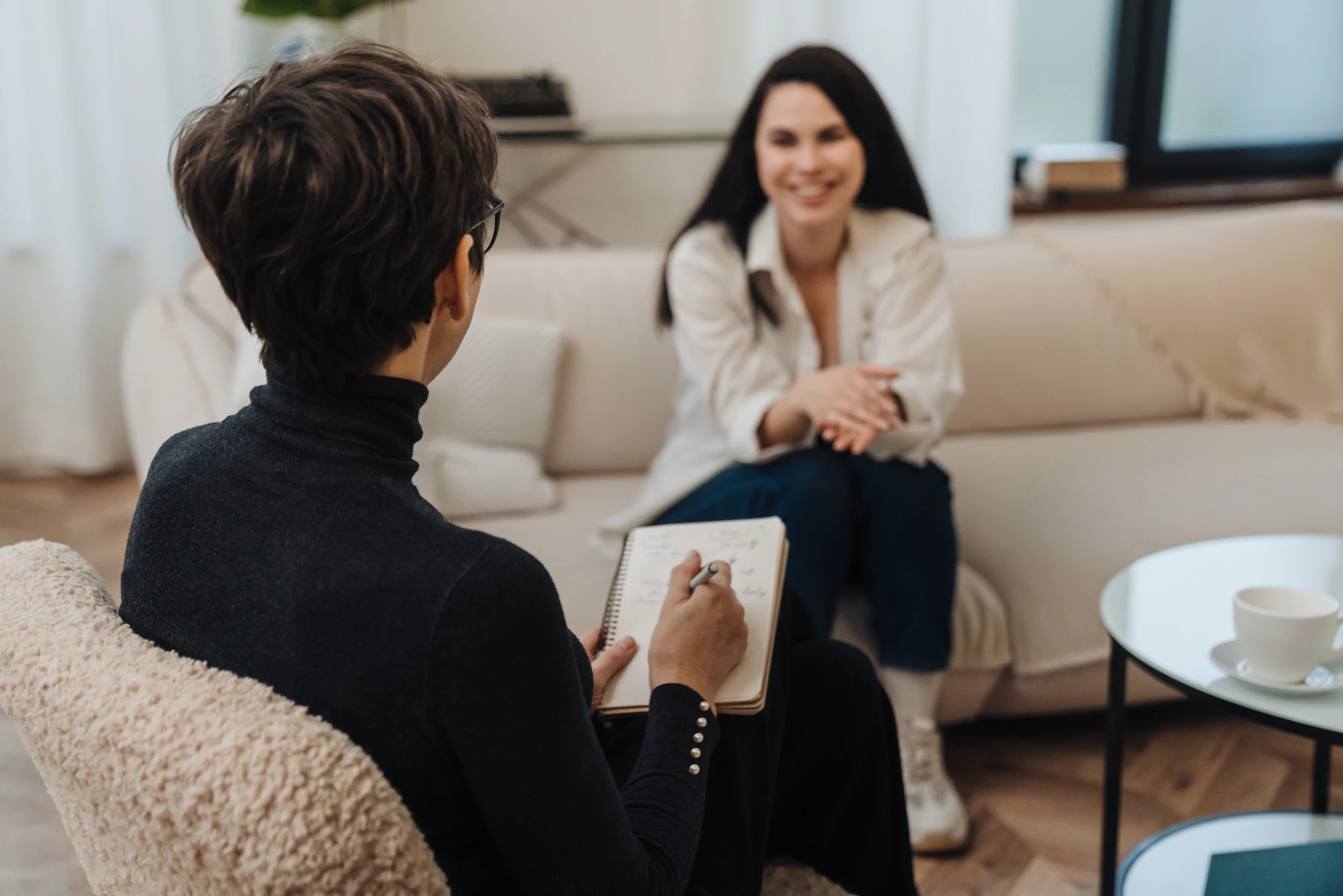 Woman talking with a doctor during a medical evaluation appointment